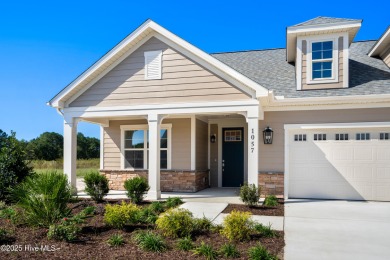 Ranch living at its best in this Promenade III Plan with on Ocean Ridge Plantation in North Carolina - for sale on GolfHomes.com, golf home, golf lot