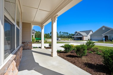 Ranch living at its best in this Promenade III Plan with on Ocean Ridge Plantation in North Carolina - for sale on GolfHomes.com, golf home, golf lot