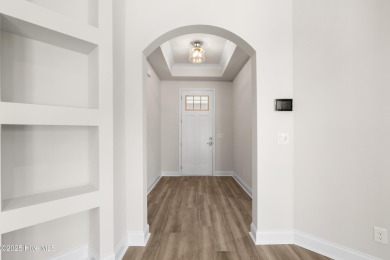 Ranch living at its best in this Promenade III Plan with on Ocean Ridge Plantation in North Carolina - for sale on GolfHomes.com, golf home, golf lot