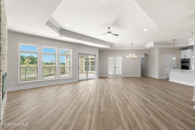 Ranch living at its best in this Promenade III Plan with on Ocean Ridge Plantation in North Carolina - for sale on GolfHomes.com, golf home, golf lot