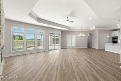 Ranch living at its best in this Promenade III Plan with on Ocean Ridge Plantation in North Carolina - for sale on GolfHomes.com, golf home, golf lot