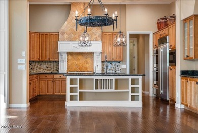 Welcome to 12971 W Fossil Drive, where timeless elegance meets on Trilogy Golf Club At Vistancia in Arizona - for sale on GolfHomes.com, golf home, golf lot