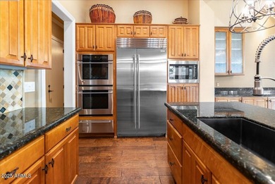 Welcome to 12971 W Fossil Drive, where timeless elegance meets on Trilogy Golf Club At Vistancia in Arizona - for sale on GolfHomes.com, golf home, golf lot