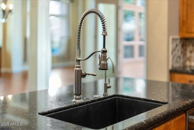 Welcome to 12971 W Fossil Drive, where timeless elegance meets on Trilogy Golf Club At Vistancia in Arizona - for sale on GolfHomes.com, golf home, golf lot