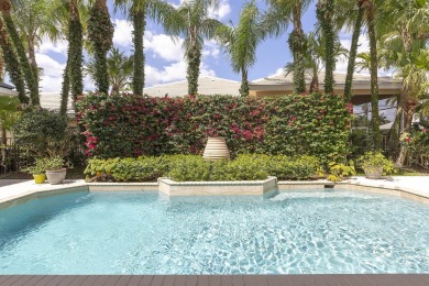 This beautiful courtyard home features four bedrooms on Palm Beach Polo and Country Club in Florida - for sale on GolfHomes.com, golf home, golf lot