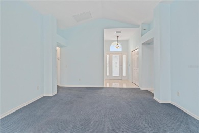 The first time offered for sale since new, this expanded on The Links of Spruce Creek in Florida - for sale on GolfHomes.com, golf home, golf lot