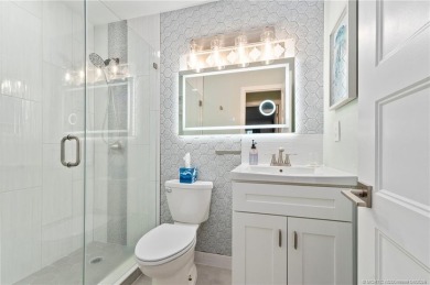 Stunning renovated condo w/ impact windows and unlimited golf in on Monterey Yacht and Country Club in Florida - for sale on GolfHomes.com, golf home, golf lot