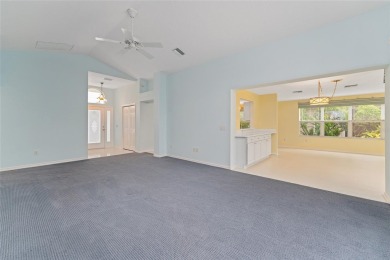 The first time offered for sale since new, this expanded on The Links of Spruce Creek in Florida - for sale on GolfHomes.com, golf home, golf lot