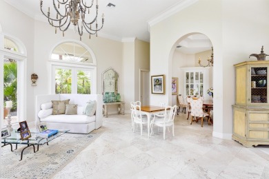 This beautiful courtyard home features four bedrooms on Palm Beach Polo and Country Club in Florida - for sale on GolfHomes.com, golf home, golf lot