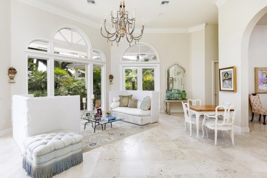 This beautiful courtyard home features four bedrooms on Palm Beach Polo and Country Club in Florida - for sale on GolfHomes.com, golf home, golf lot