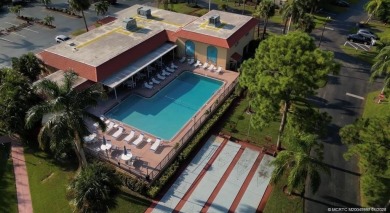 Stunning renovated condo w/ impact windows and unlimited golf in on Monterey Yacht and Country Club in Florida - for sale on GolfHomes.com, golf home, golf lot