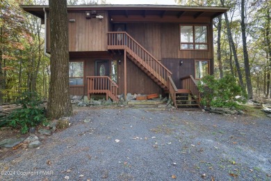 Welcome to your serene sanctuary, filled with natural light and on Lords Valley Country Club, Inc in Pennsylvania - for sale on GolfHomes.com, golf home, golf lot