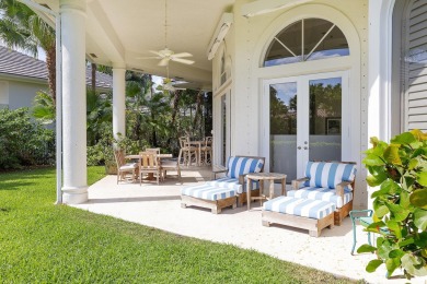 This beautiful courtyard home features four bedrooms on Palm Beach Polo and Country Club in Florida - for sale on GolfHomes.com, golf home, golf lot