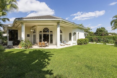 This beautiful courtyard home features four bedrooms on Palm Beach Polo and Country Club in Florida - for sale on GolfHomes.com, golf home, golf lot