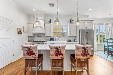 Elegance and style meet comfort in this exceptional home on The National Golf Club of Louisiana in Louisiana - for sale on GolfHomes.com, golf home, golf lot