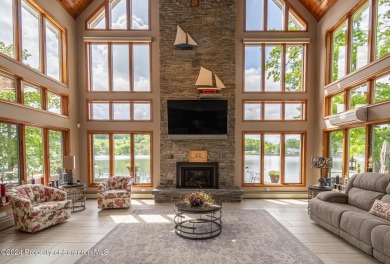 Indulge in the epitome of lakeside living with this exquisite on Scranton Canoe Club in Pennsylvania - for sale on GolfHomes.com, golf home, golf lot