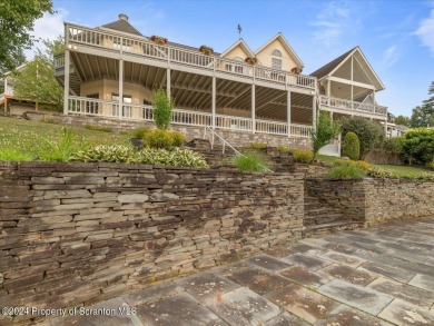 This amazing, 5600+ sqft lake home on near half an acre is a on Scranton Canoe Club in Pennsylvania - for sale on GolfHomes.com, golf home, golf lot