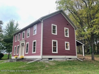 A restoration beyond compare!  This 1850's center hall colonial on Lakeland Golf Course in Pennsylvania - for sale on GolfHomes.com, golf home, golf lot