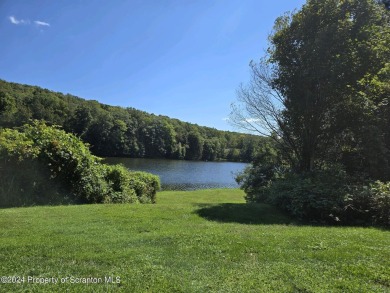 Saddle Lake prime building lot with views of the lake. Included on Stone Hedge Golf Course in Pennsylvania - for sale on GolfHomes.com, golf home, golf lot