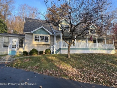 SADDLE LAKE with Lake Rights. Like new Cape.. Located on over an on Stone Hedge Golf Course in Pennsylvania - for sale on GolfHomes.com, golf home, golf lot