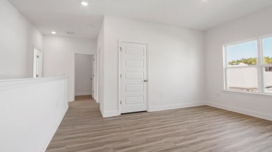 Welcome to the Carol, a new home floorplan at Sanctuary Beach in on Bay Point Resort Golf Club in Florida - for sale on GolfHomes.com, golf home, golf lot