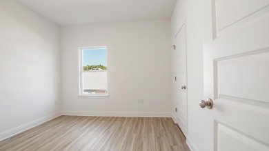 Welcome to the Carol, a new home floorplan at Sanctuary Beach in on Bay Point Resort Golf Club in Florida - for sale on GolfHomes.com, golf home, golf lot