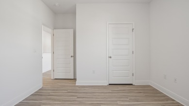 Welcome to the Carol, a new home floorplan at Sanctuary Beach in on Bay Point Resort Golf Club in Florida - for sale on GolfHomes.com, golf home, golf lot