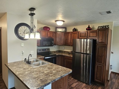 This stunning 2 bedroom, 2.5 bath townhome is calling your name! on Rolling Hills Golf Club in South Dakota - for sale on GolfHomes.com, golf home, golf lot