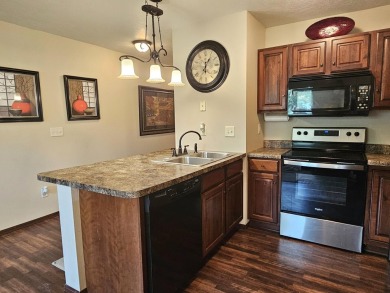 This stunning 2 bedroom, 2.5 bath townhome is calling your name! on Rolling Hills Golf Club in South Dakota - for sale on GolfHomes.com, golf home, golf lot