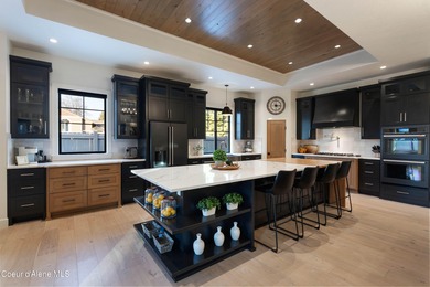 Modern craftsman design meets an exceptional location in this on Hayden Lake Country Club in Idaho - for sale on GolfHomes.com, golf home, golf lot