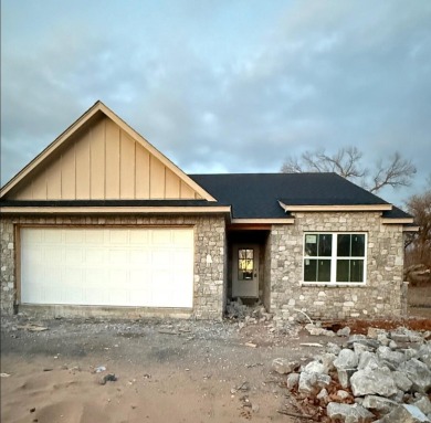 Check out this new construction in The Coves at Bird Island! on The Coves Golf Course in Oklahoma - for sale on GolfHomes.com, golf home, golf lot