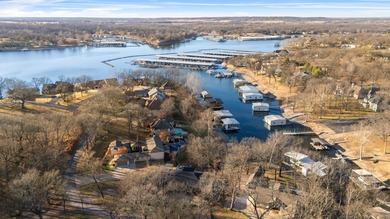 Waterfront luxury on Ridge Road in the gated community of The on The Coves Golf Course in Oklahoma - for sale on GolfHomes.com, golf home, golf lot