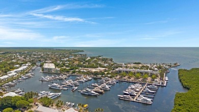 Ideally located on the world-class private Marina of Ocean Reef on Ocean Reef Club in Florida - for sale on GolfHomes.com, golf home, golf lot