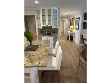 PRICED TO SELL! Unique top floor 2 bedroom 2 bath Fairway Lakes on Ocean Reef Club in Florida - for sale on GolfHomes.com, golf home, golf lot