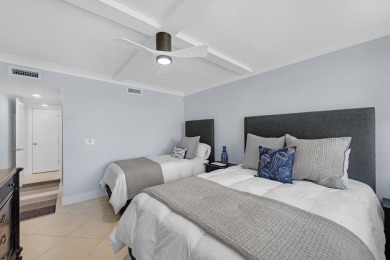 This sought after first floor Fairway Lakes corner unit has on Ocean Reef Club in Florida - for sale on GolfHomes.com, golf home, golf lot