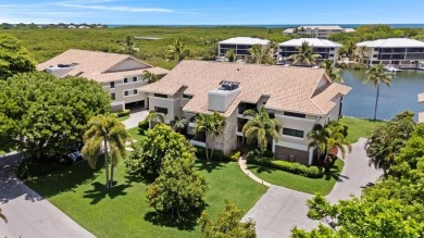 Top-Floor Spacious 3-Bedroom Condo with Dock  Water Views! on Card Sound Golf Club in Florida - for sale on GolfHomes.com, golf home, golf lot