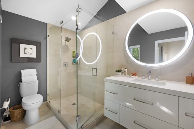This renovated lakefront home offers comfort, style, and serene on Ocean Reef Club in Florida - for sale on GolfHomes.com, golf home, golf lot