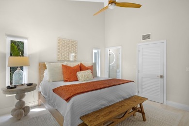 This renovated lakefront home offers comfort, style, and serene on Ocean Reef Club in Florida - for sale on GolfHomes.com, golf home, golf lot