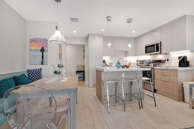 Experience the best of Ocean Reef in this fully renovated on Card Sound Golf Club in Florida - for sale on GolfHomes.com, golf home, golf lot