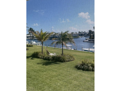 Sleek and modern 1 bedroom/1 bathroom condo with fabulous views on Card Sound Golf Club in Florida - for sale on GolfHomes.com, golf home, golf lot