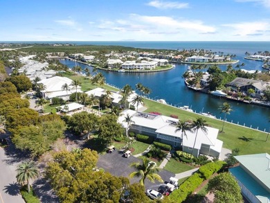 Sleek and modern 1 bedroom/1 bathroom condo with fabulous views on Card Sound Golf Club in Florida - for sale on GolfHomes.com, golf home, golf lot
