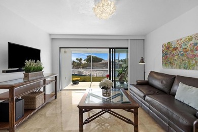 Sleek and modern 1 bedroom/1 bathroom condo with fabulous views on Card Sound Golf Club in Florida - for sale on GolfHomes.com, golf home, golf lot