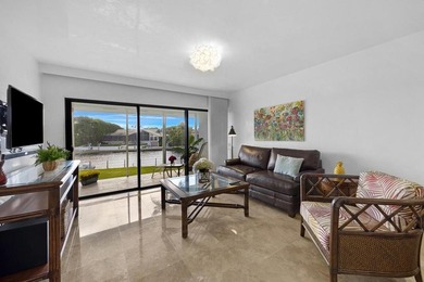 Sleek and modern 1 bedroom/1 bathroom condo with fabulous views on Card Sound Golf Club in Florida - for sale on GolfHomes.com, golf home, golf lot