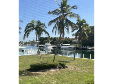 This 2-bedroom, 2-bathroom condo in Angelfish Cay Association #3 on Card Sound Golf Club in Florida - for sale on GolfHomes.com, golf home, golf lot