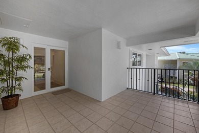 This 2-bedroom, 2-bathroom condo in Angelfish Cay Association #3 on Card Sound Golf Club in Florida - for sale on GolfHomes.com, golf home, golf lot