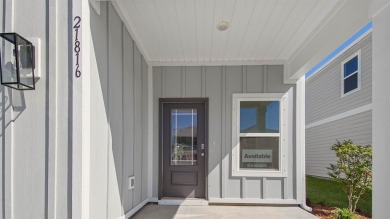 Welcome to the Monroe, a new home floor plan located at on Bay Point Resort Golf Club in Florida - for sale on GolfHomes.com, golf home, golf lot
