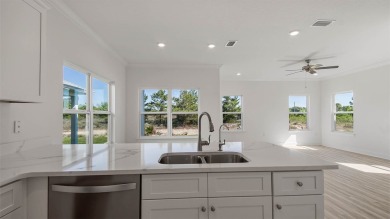 Welcome to the Monroe, a new home floor plan located at on Bay Point Resort Golf Club in Florida - for sale on GolfHomes.com, golf home, golf lot