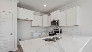 Welcome to the Monroe, a new home floor plan located at on Bay Point Resort Golf Club in Florida - for sale on GolfHomes.com, golf home, golf lot