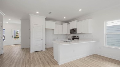Welcome to the Monroe, a new home floor plan located at on Bay Point Resort Golf Club in Florida - for sale on GolfHomes.com, golf home, golf lot