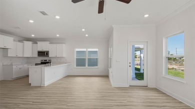 Welcome to the Monroe, a new home floor plan located at on Bay Point Resort Golf Club in Florida - for sale on GolfHomes.com, golf home, golf lot